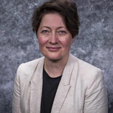 Sarah Lewthwaite smiling in white jacket 